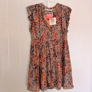 Marie Oliver dress. Silk, ruffle sleeves and button up front